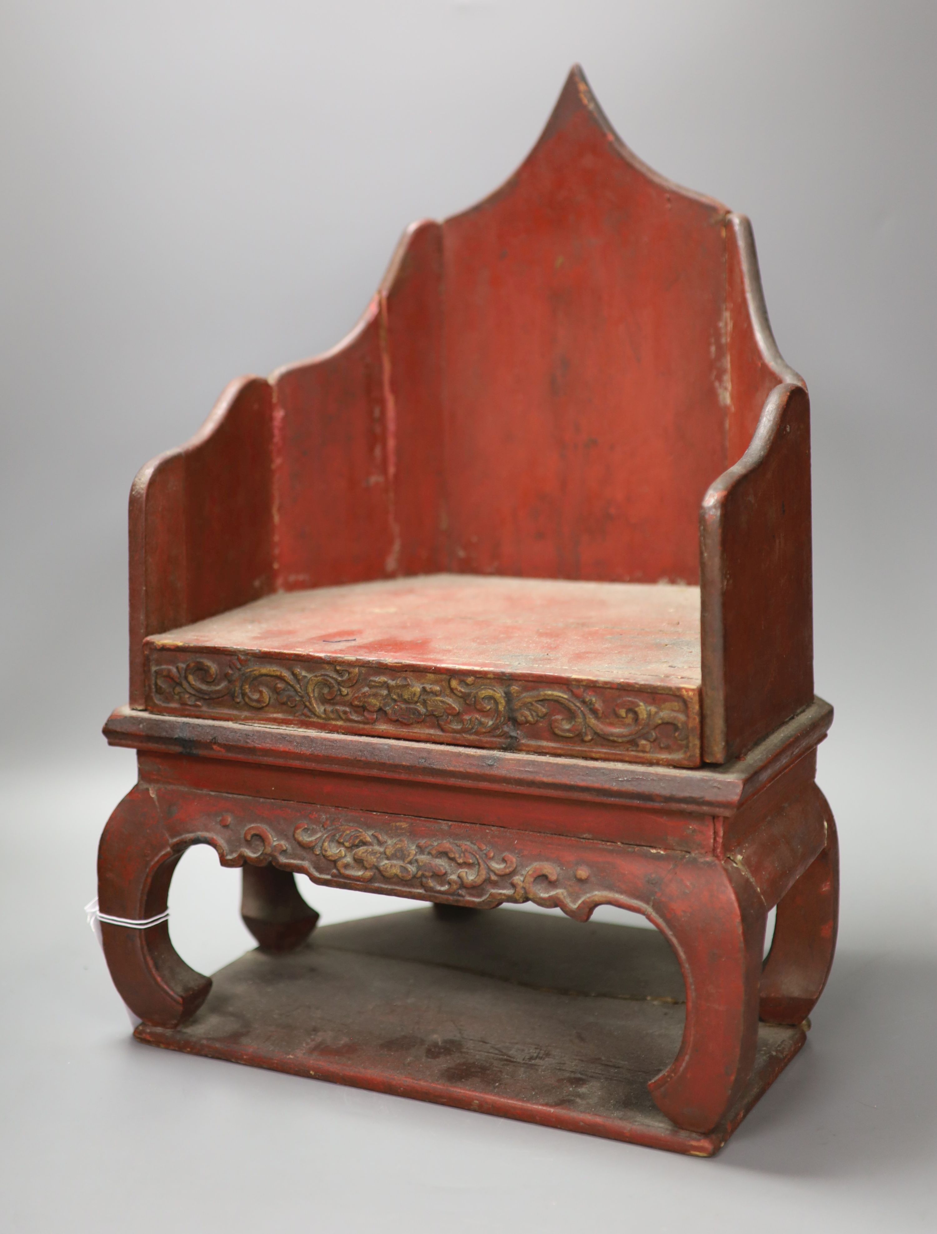 A Japanese lacquered wood model throne for an altar figure, height 46cm